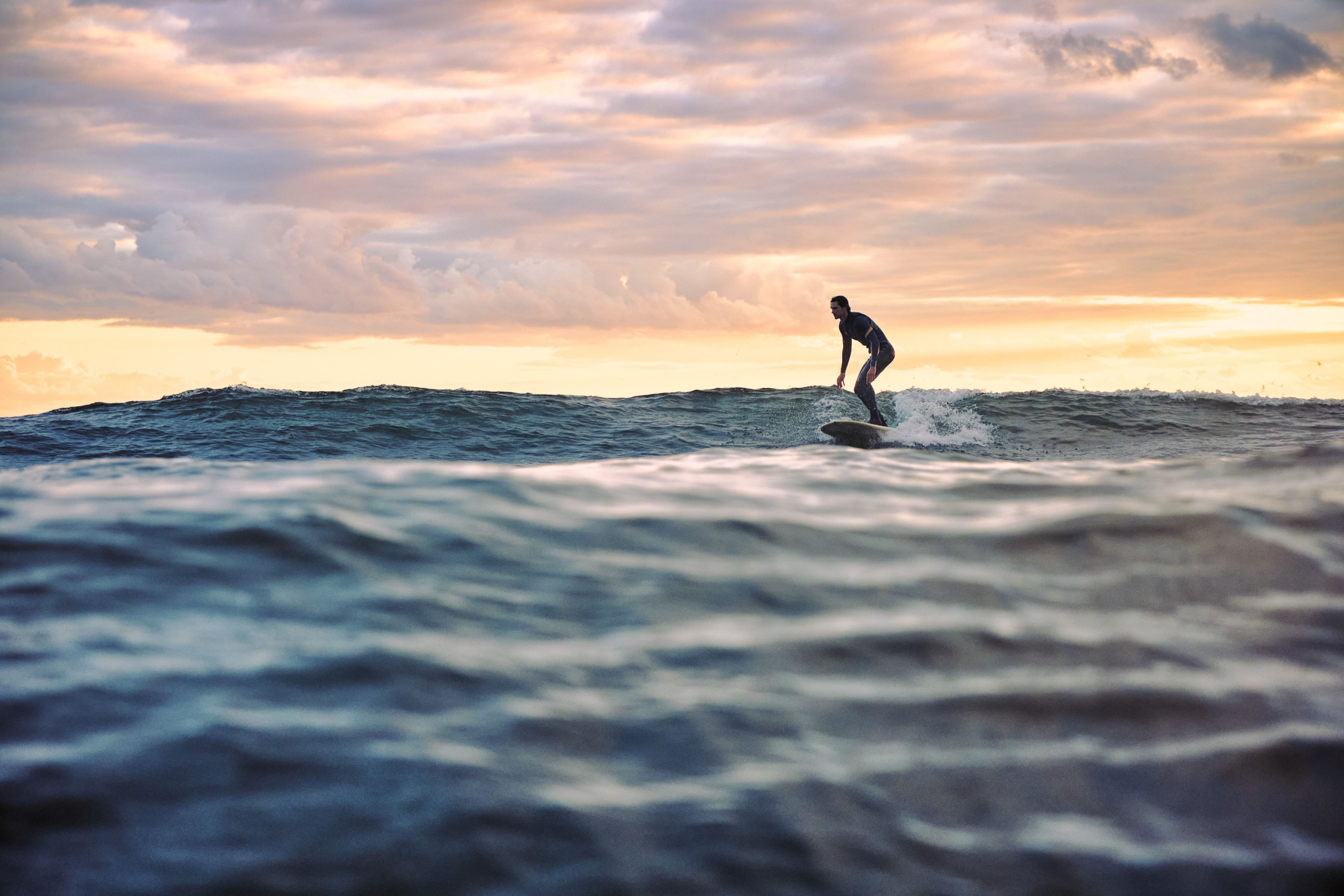 Surfing in Michigan A man surfing on the Great Lakes.