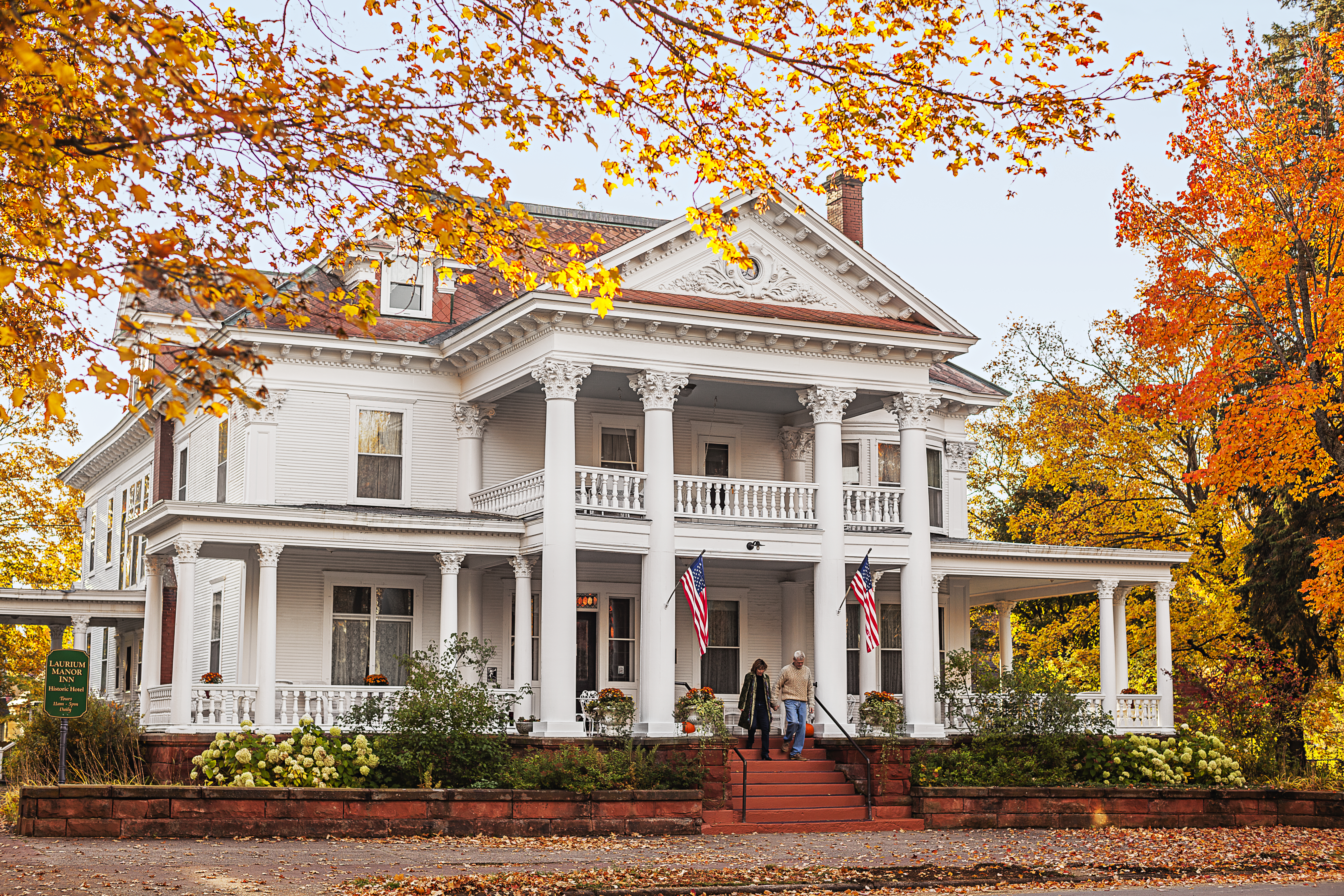 Laurium Manor Inn Exterior of a historic inn during fall.