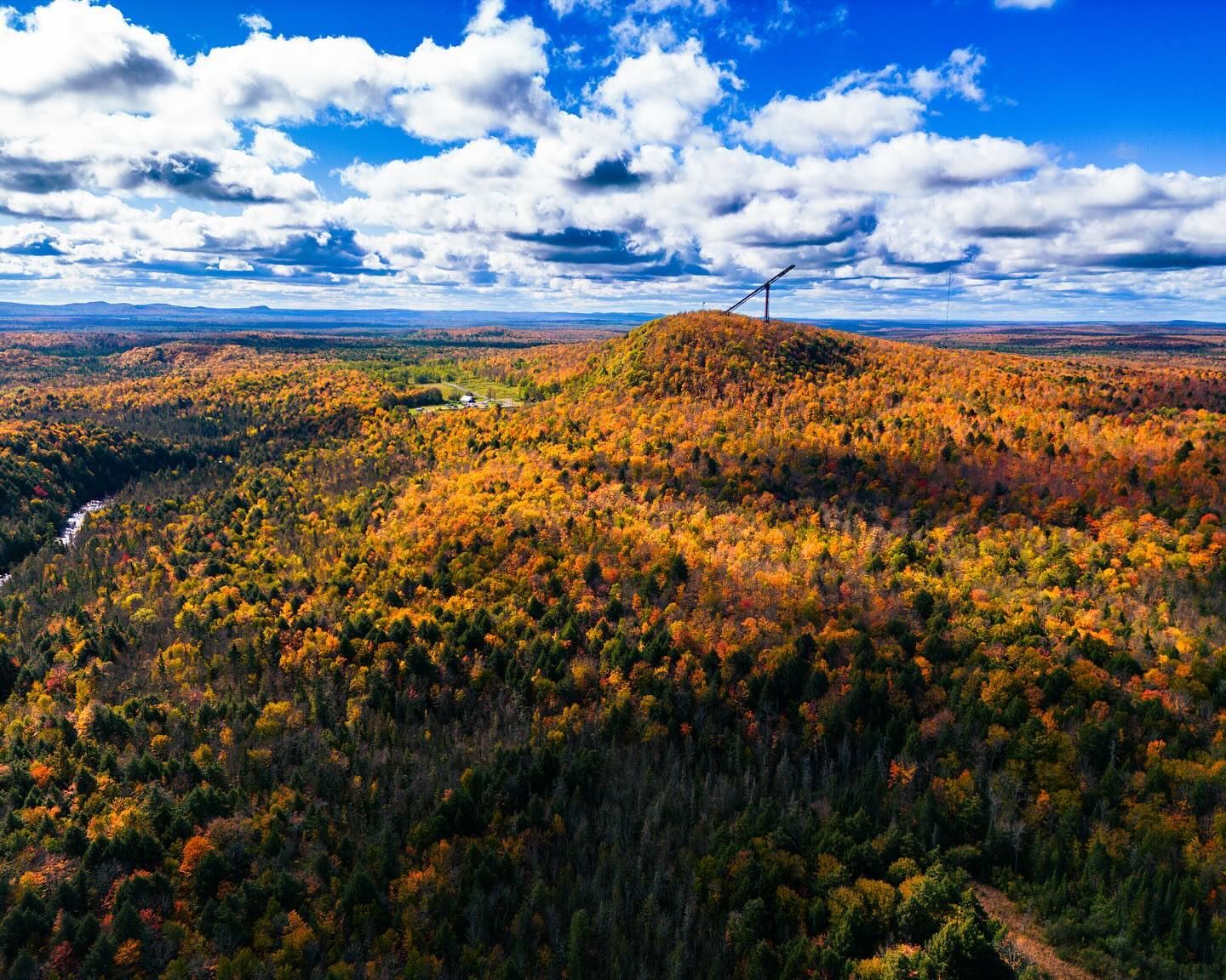 Copper Peak Copper Peak Ski Jump surrounded by a fall forest