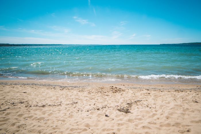 Wave on the beach at Petoskey State Park.