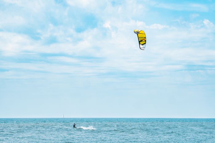 A windsurfer off the coast of Tiscornia Park.